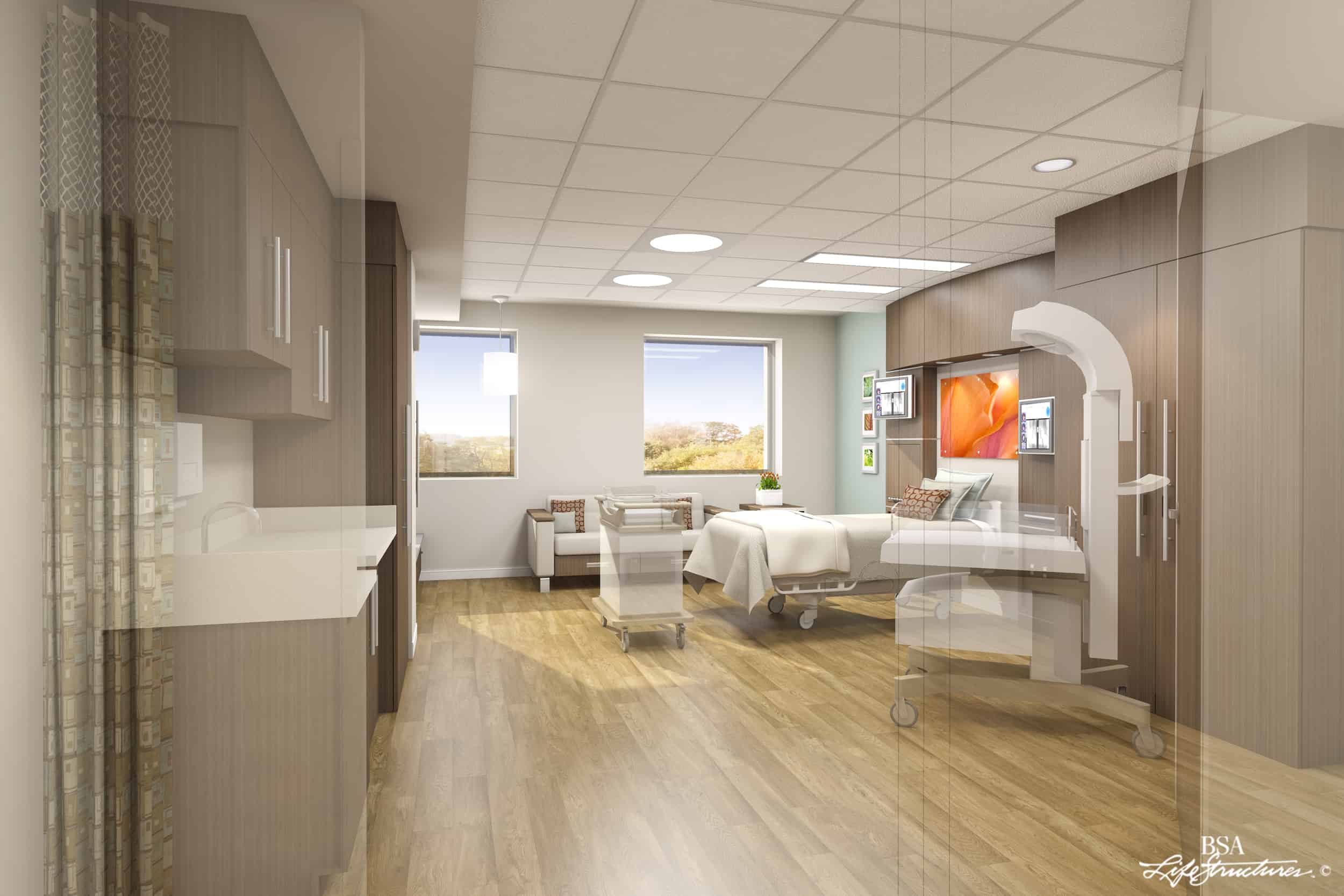 This image shows a rendering of a modern healthcare patient room with a minimalist design. The room features a single bed surrounded by wood cabinets for storage. This is a labor and delivery room, as evidenced by the baby bassinet on rolling wheels next to the bed. There are two large windows on the back wall, offering views of trees and greenery outside, bringing natural light into the space. The overall design combines functionality with a calming aesthetic, using a soft color palette of whites, light woods, blue, and subtle orange accents to create a soothing healthcare environment.