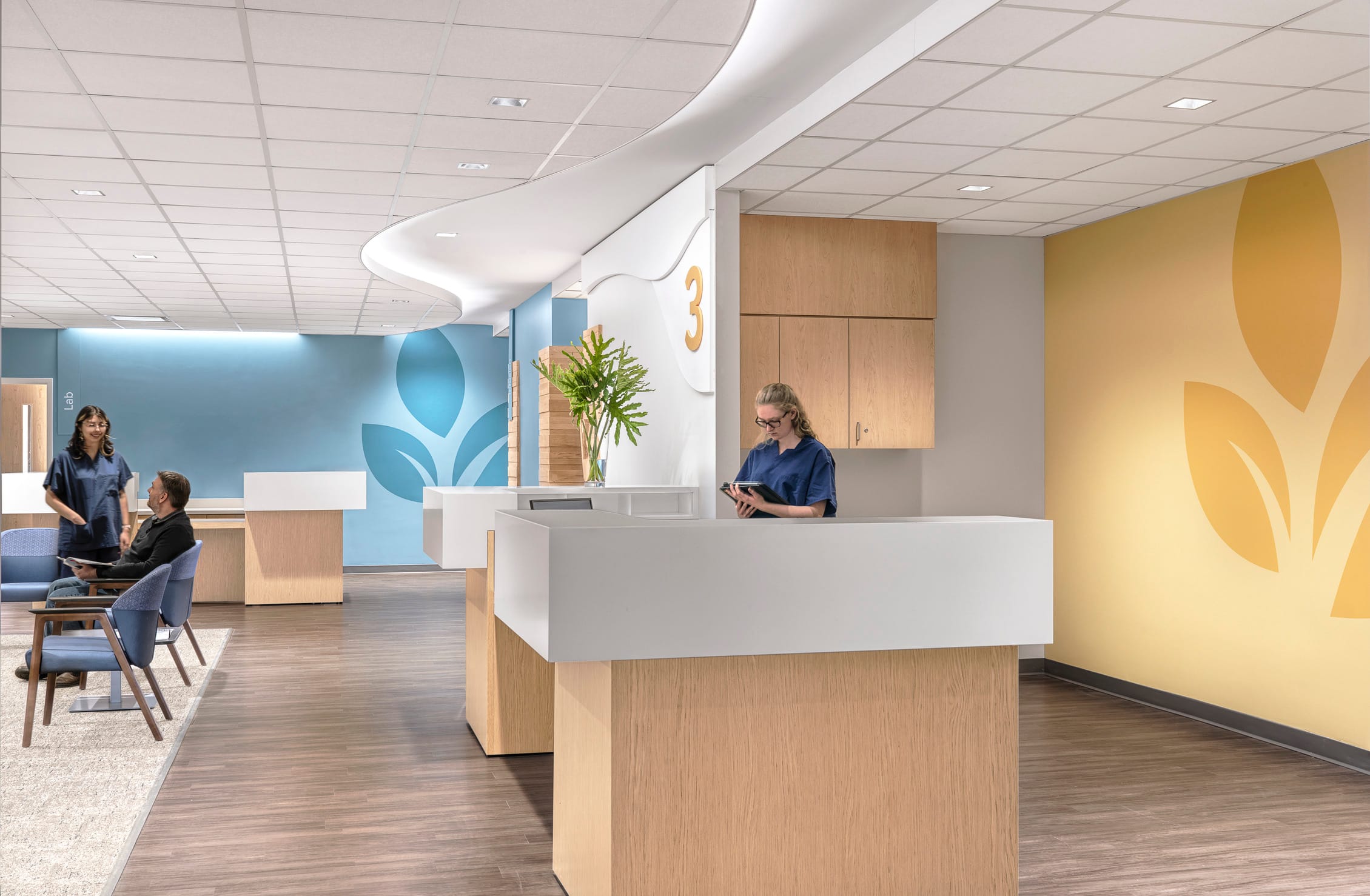 This image shows another area of the Jacksonville Memorial Health facility, featuring a reception or check-in counter for what appears to be a clinical department, marked with the number