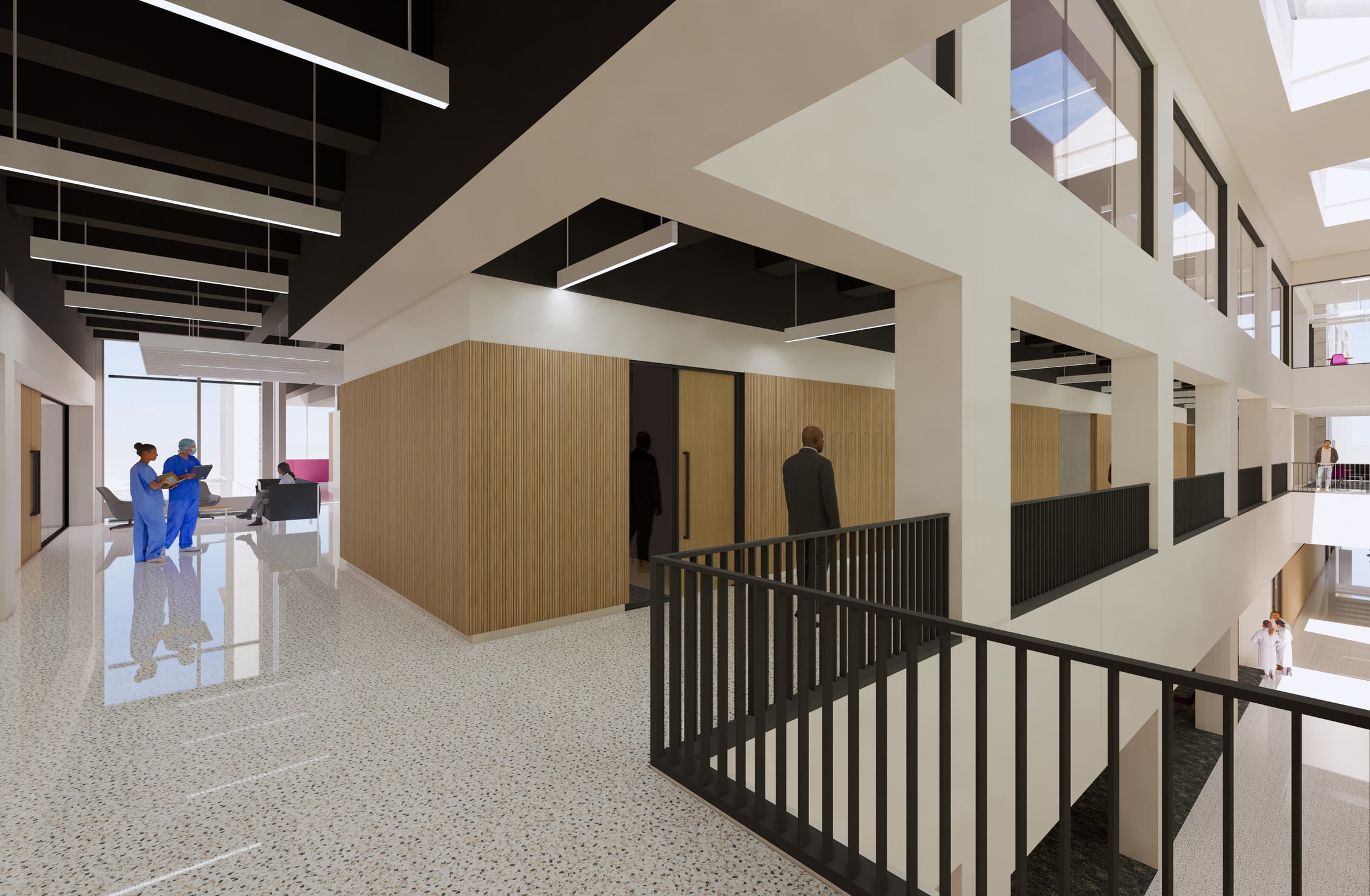 This interior rendering showcases a modern medical education facility with an open, multi-level design. The ECU Brody School of Medicine interior features a sophisticated architectural layout with white structural beams, black ceiling details, and suspended linear lighting. Wooden-clad office or exam room enclosures create warm accents against the terrazzo-style speckled flooring. Two healthcare professionals in blue scrubs converse on the left, while other figures are visible throughout the space, including someone in business attire approaching a doorway. Black metal railings define the upper-level walkways and stairwell areas, and natural light floods in through large windows. The overall design balances clinical functionality with contemporary aesthetics, creating a bright, professional environment with clear sightlines across multiple levels.
